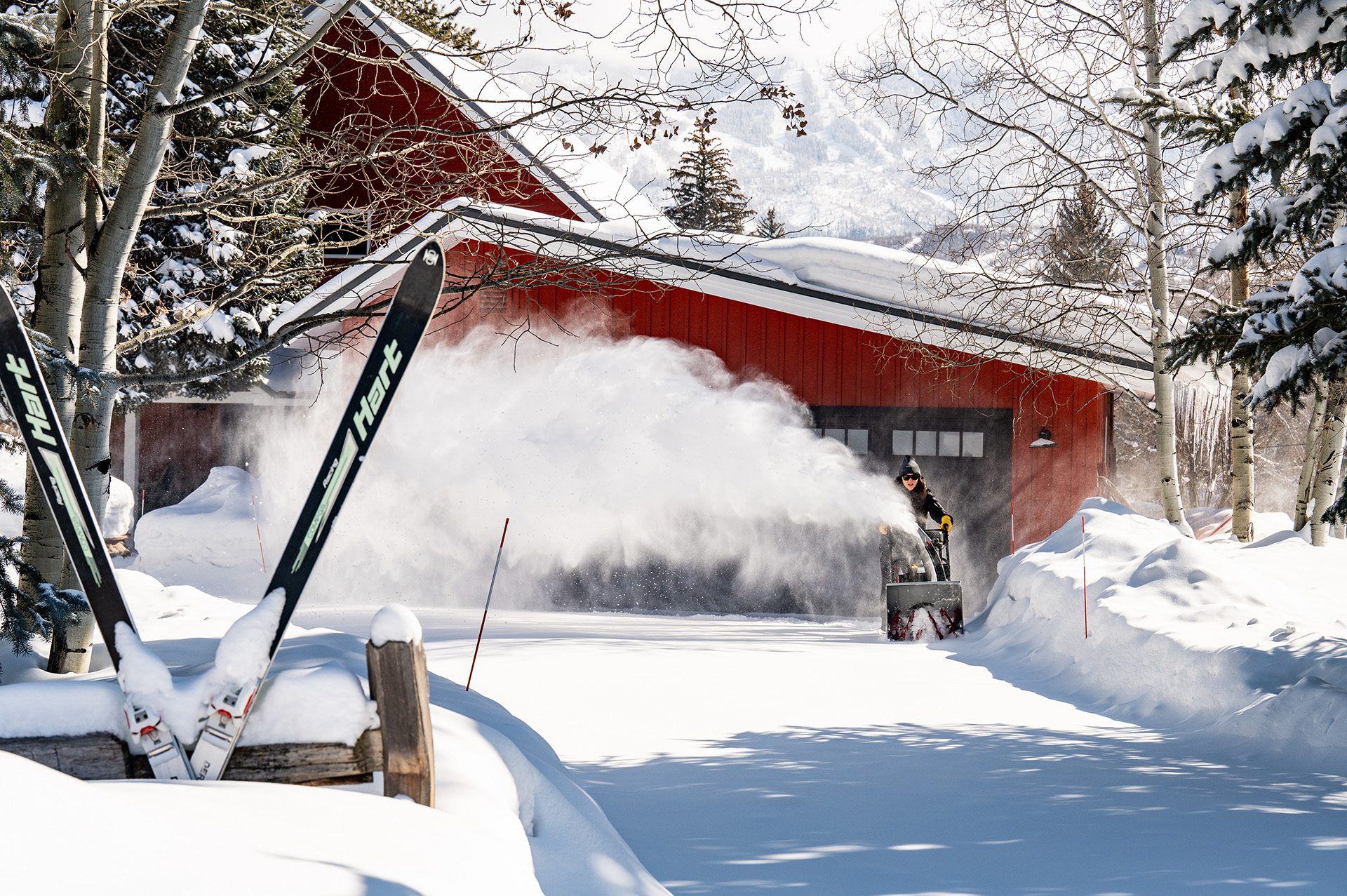 Murray two-stage snow blower being used on driveway