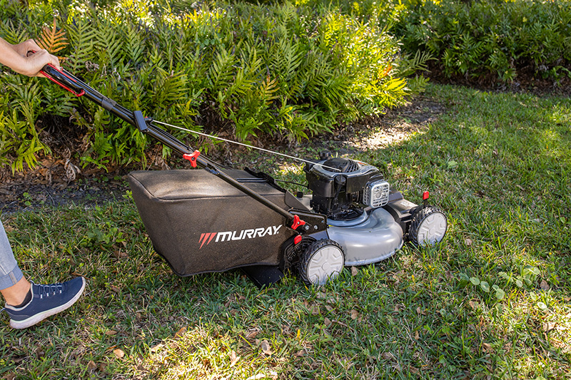Person using Murray self-propelled lawn mower