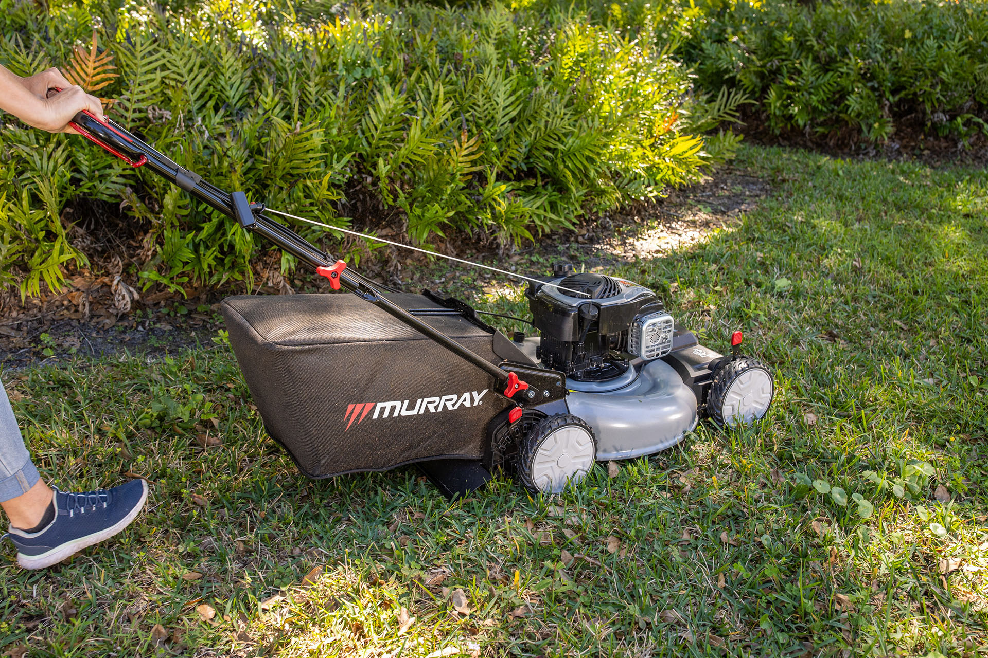 Person using Murray self-propelled lawn mower